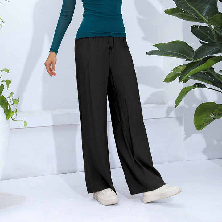 Dame bred og afslappet stofbuks med sidelommer Stilla