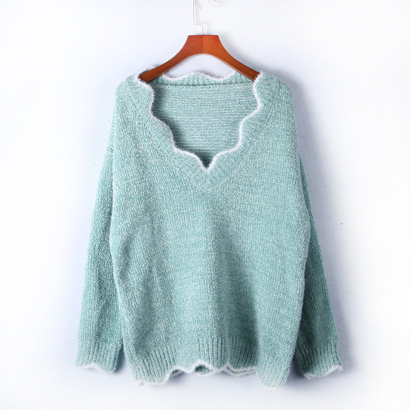 Dame afslappet strik pullover med V-hals og struktureret stof Stilla