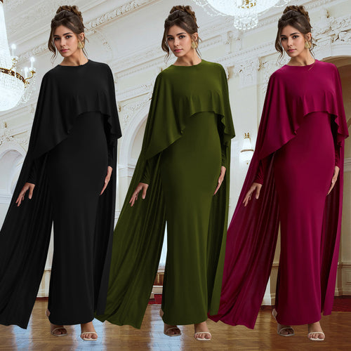 Dame elegant maxikjole med flydende capesnit og langærmet design Stilla
