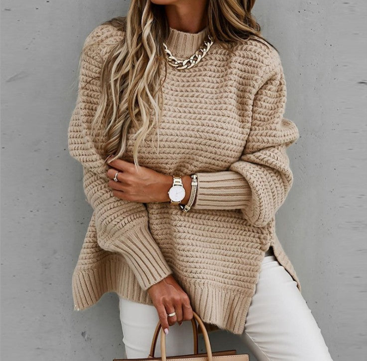 Kvindernes chunky strik sweater med høj hals og sidelunger Stilla