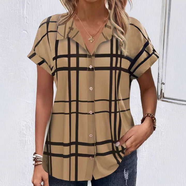 Dameternetternet Bluse med moderne design og to knapstolper Stilla