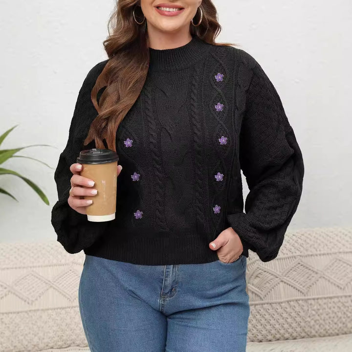 Dame strikkepullover med floralt broderi og afslappet snit Stilla