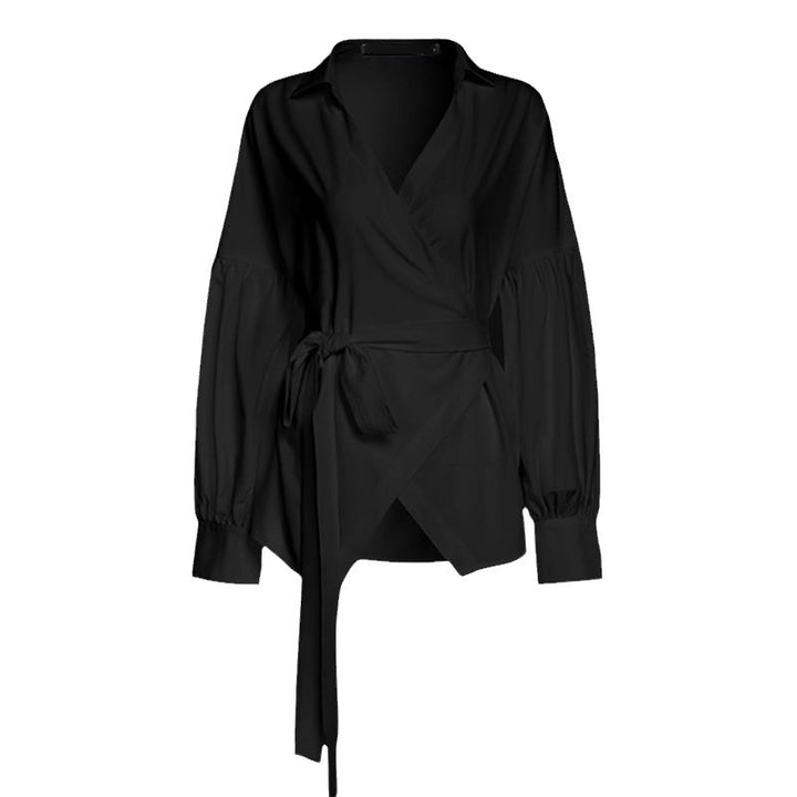 Dame indpakningsbluse med elegante pufærmer og taljebælte Stilla