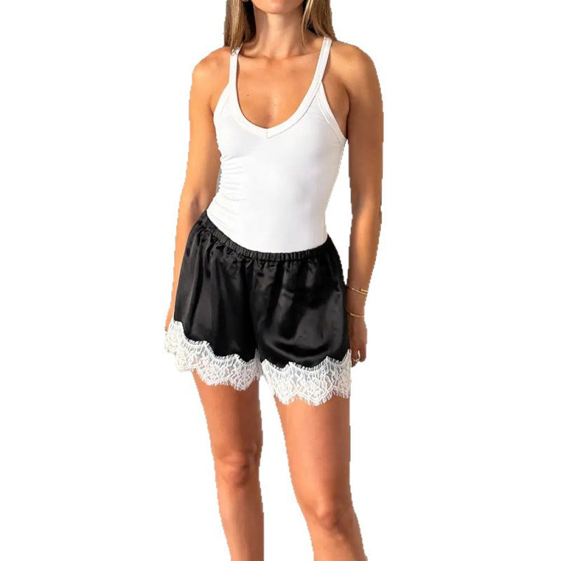 Damen Sport-Bodysuit mit elastischen Shorts und Spitzenbesatz Skovae