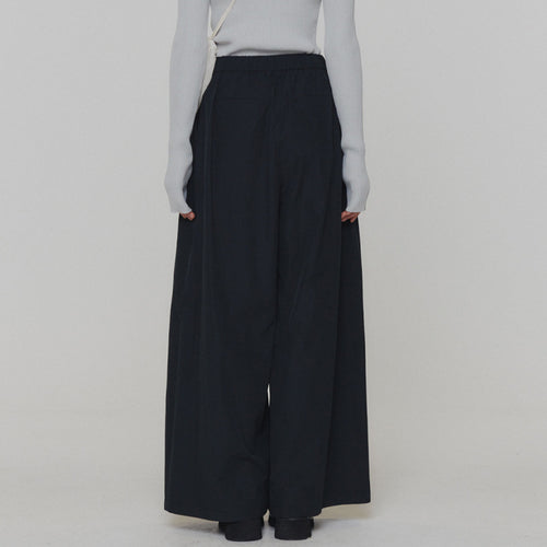 Dame Bredskårede High-Waist-bukser med elegant plisseret struktur og sidelommer Stilla