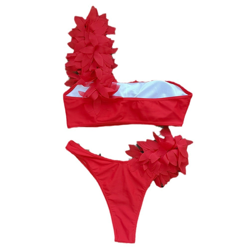 Dame bikini-sæt med asymmetrisk top og kreative blomsterapplikationer Stilla