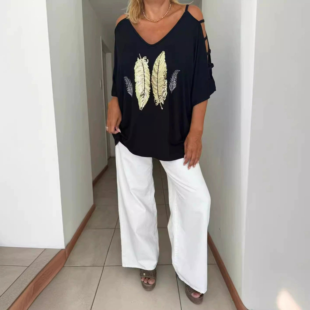 Dame Oversized T-shirt med kreative cut-outs og iøjnefaldende tryk Stilla