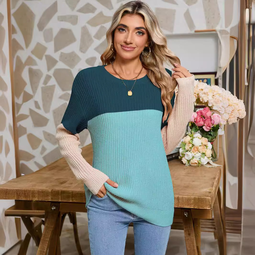 Dame strikket sweater i fashionable farveblok design Stilla