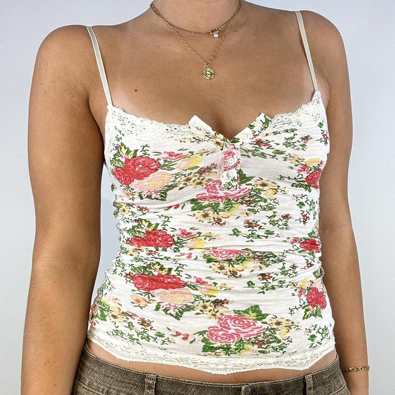 Dame spidsærmel top med blomsterdesign Skovae