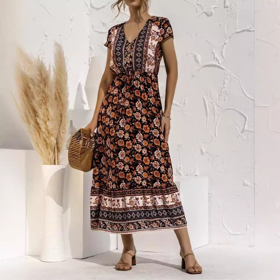 Dame maxikjole med florale mønstre og elegant taljebind Stilla