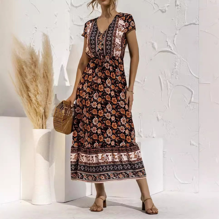 Dame maxikjole med florale mønstre og elegant taljebind Stilla