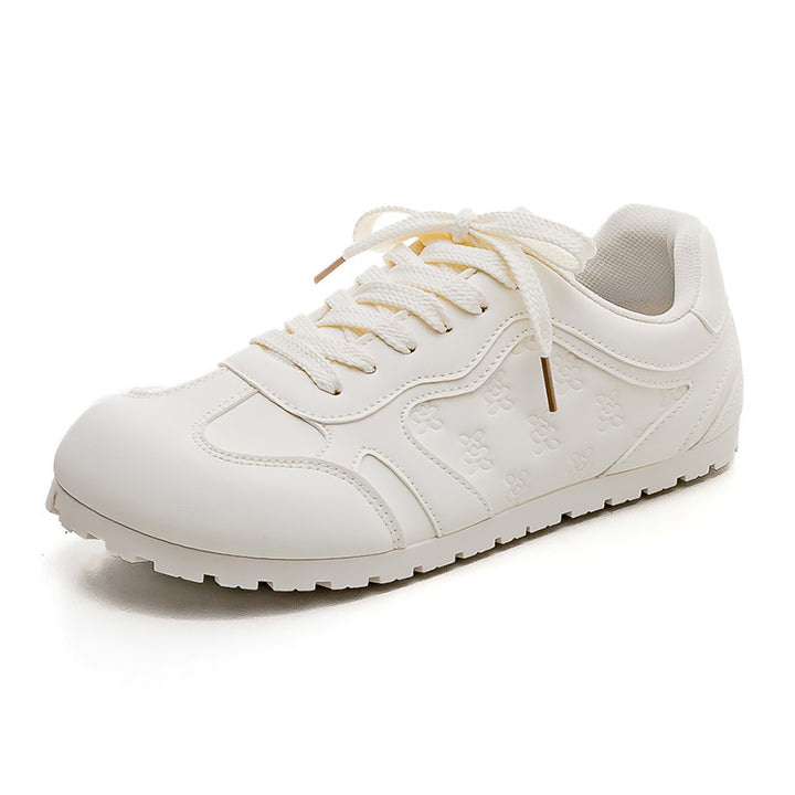 Dame Sneakers i sporty-elegant design med blomster mønster og skridsikker sål Stilla