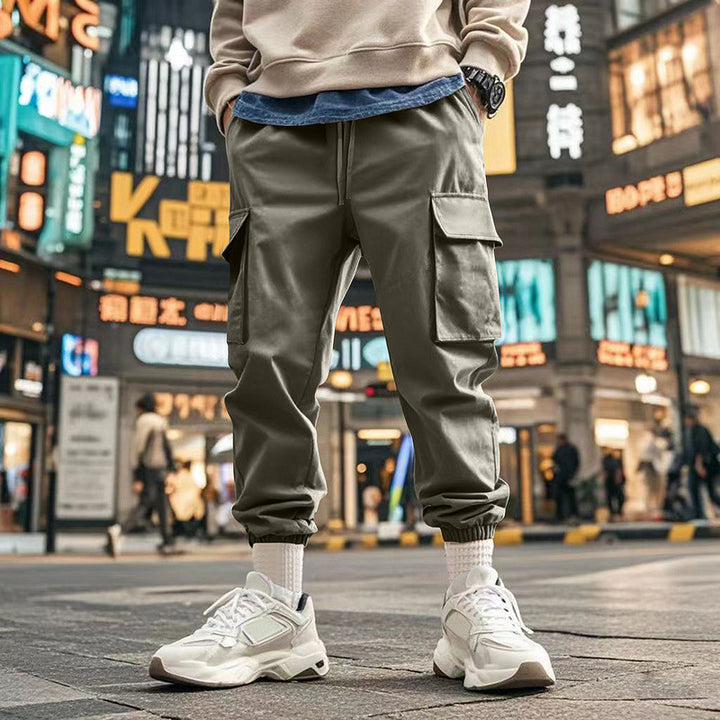 Herren nan urbane utilitariske joggere med multifunktionslommer og konisk ben Skovae