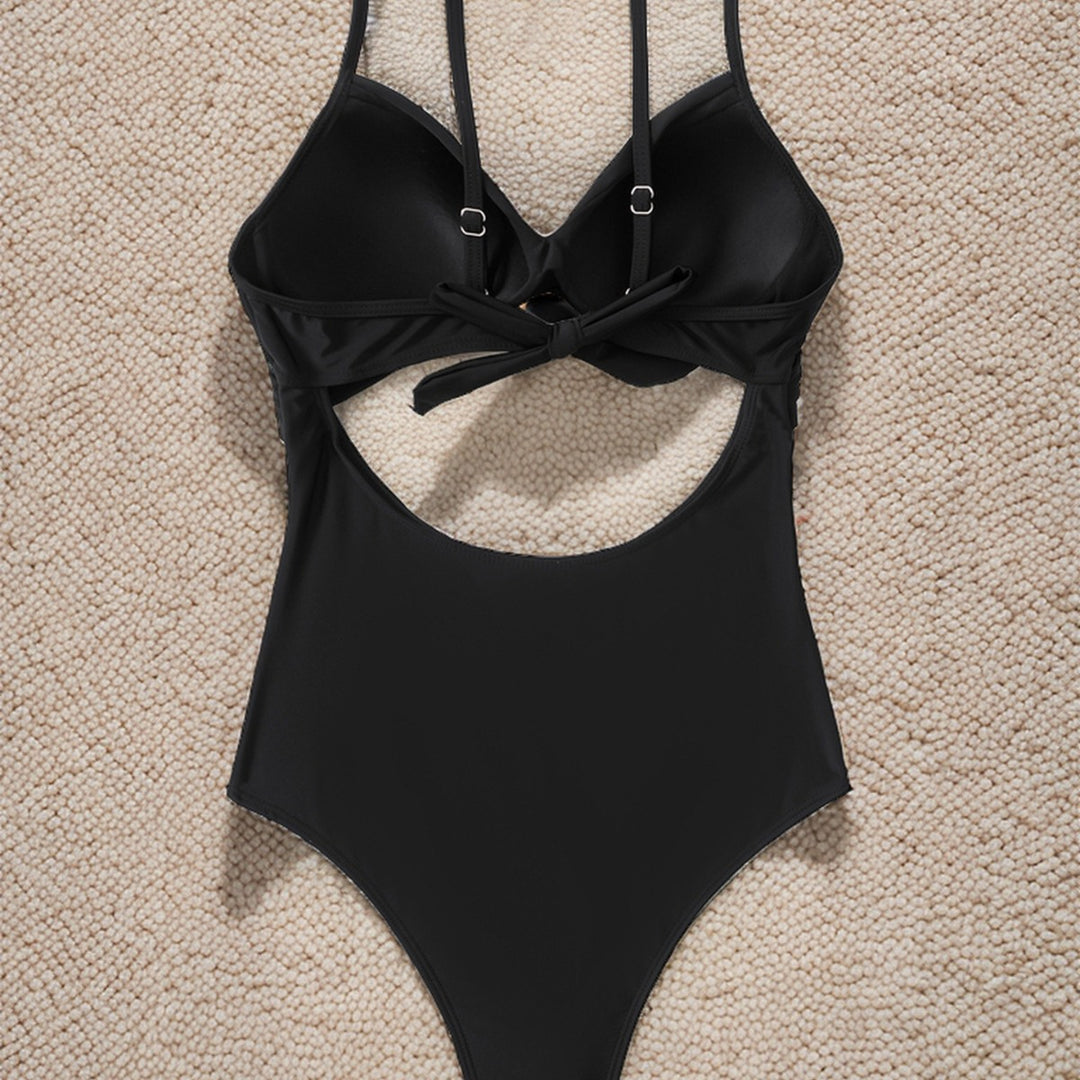 Dame Én-delt Badedragt med moderne Cut-Out og elegant Indpakningsdesign Skovae