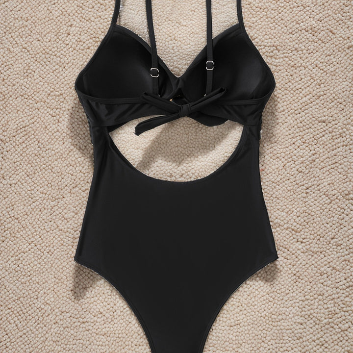Dame Én-delt Badedragt med moderne Cut-Out og elegant Indpakningsdesign Skovae