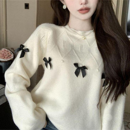 Kvinders hyggelige sweater med legende bueapplikationer Stilla