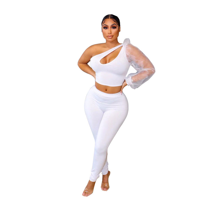 Dame trendy sæt bestående af crop top med asymmetrisk udskæring og figurnær leggings Stilla