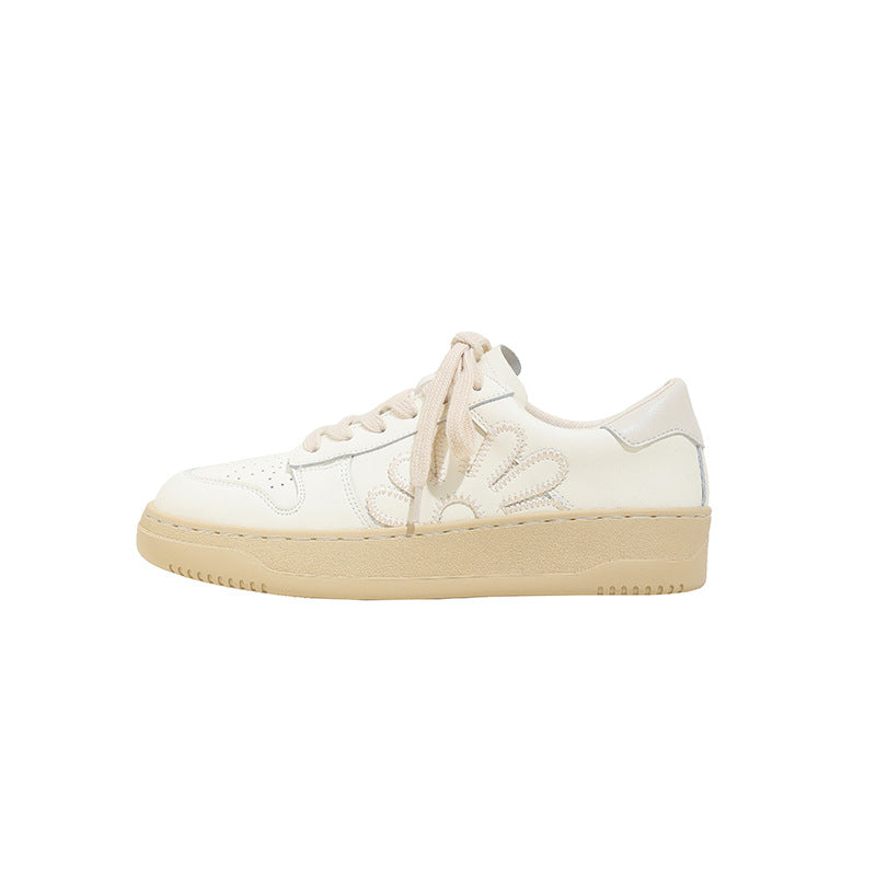 Dame Sneakers i urban design med floral applikationsdetalje og komfortabel sål Stilla