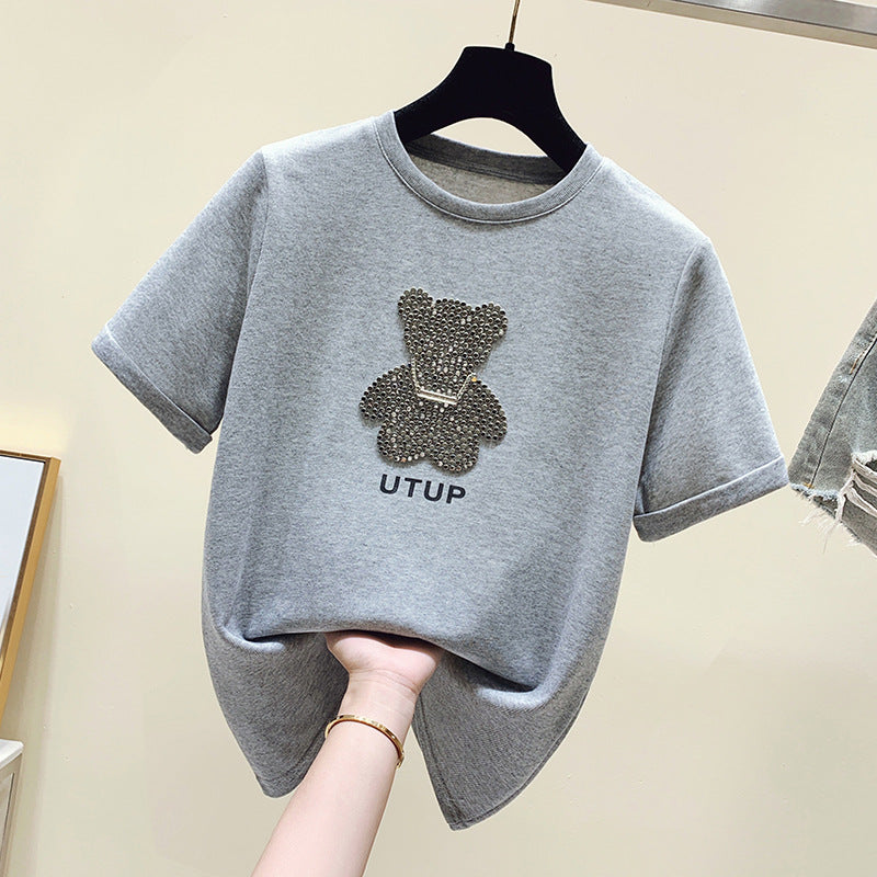 Kvinders T-shirt med funklende bjørnemotiv og afslappet pasform Stilla