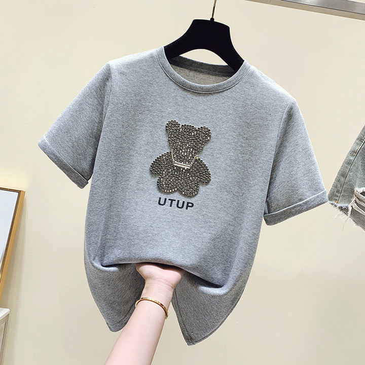 Kvinders T-shirt med funklende bjørnemotiv og afslappet pasform Stilla
