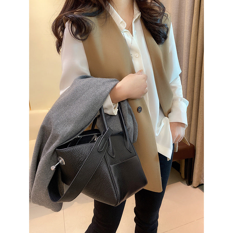 Dame elegant vest med asymmetrisk snit og praktiske lommer Stilla