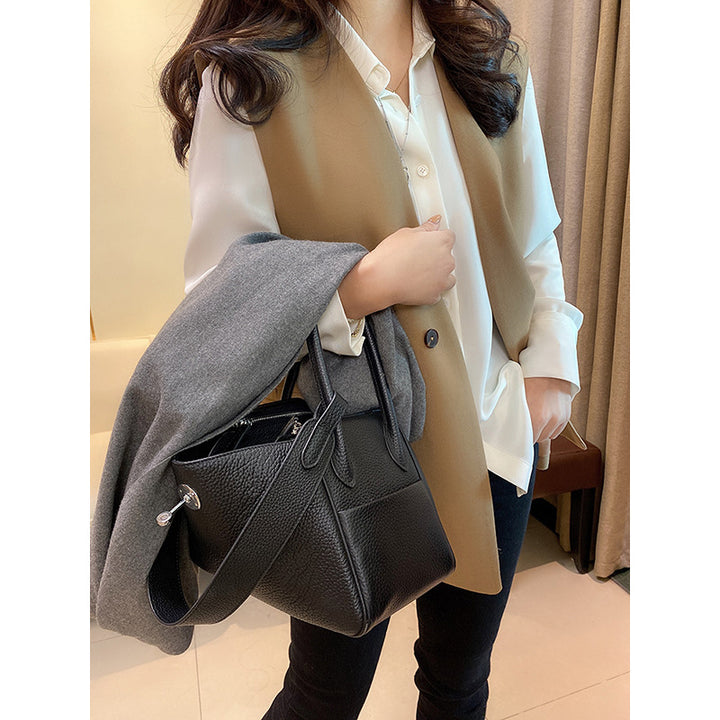 Dame elegant vest med asymmetrisk snit og praktiske lommer Stilla