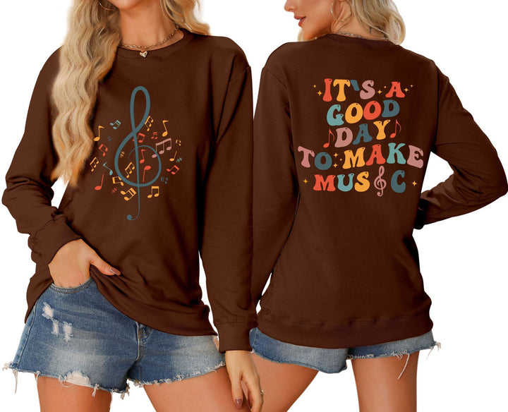 Damer sweatshirt med musikalsk motiv og kreativ tekst Stilla