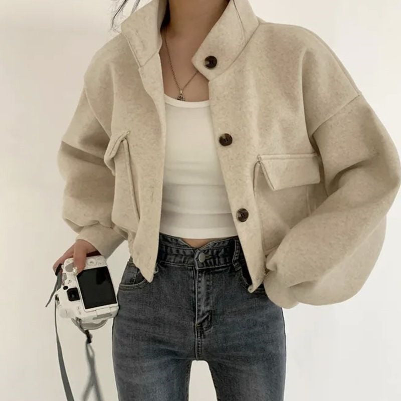 Women's cropped bomber jacket with voluminous sleeves and practical pockets
