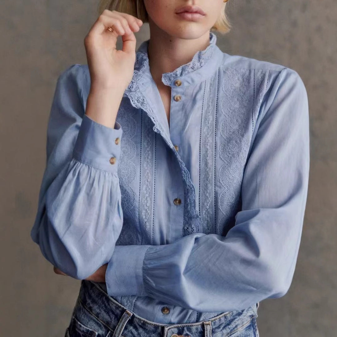 Damebluse med elegante spidsdetaljer og casual snit Stilla