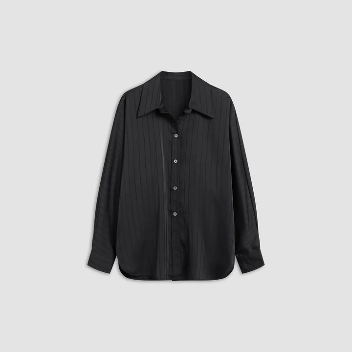 Dame asymmetrisk bluse med elegant taljeudtræk Stilla