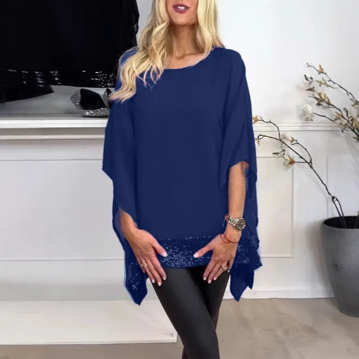 Kvindernes fashionable poncho top med elegant blonderfinish Stilla