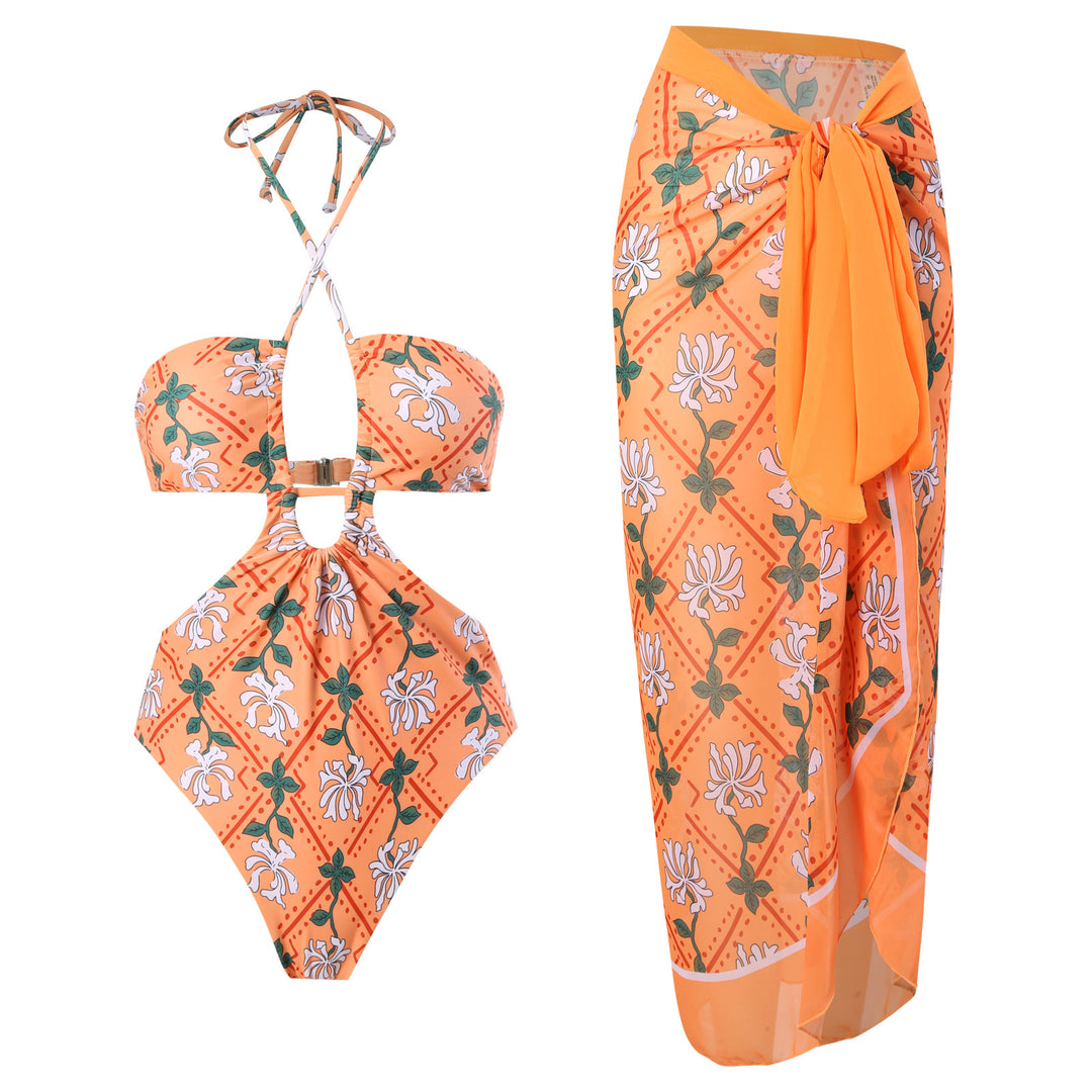 Dame badedragt med moderne snit og matchende sarong Stilla