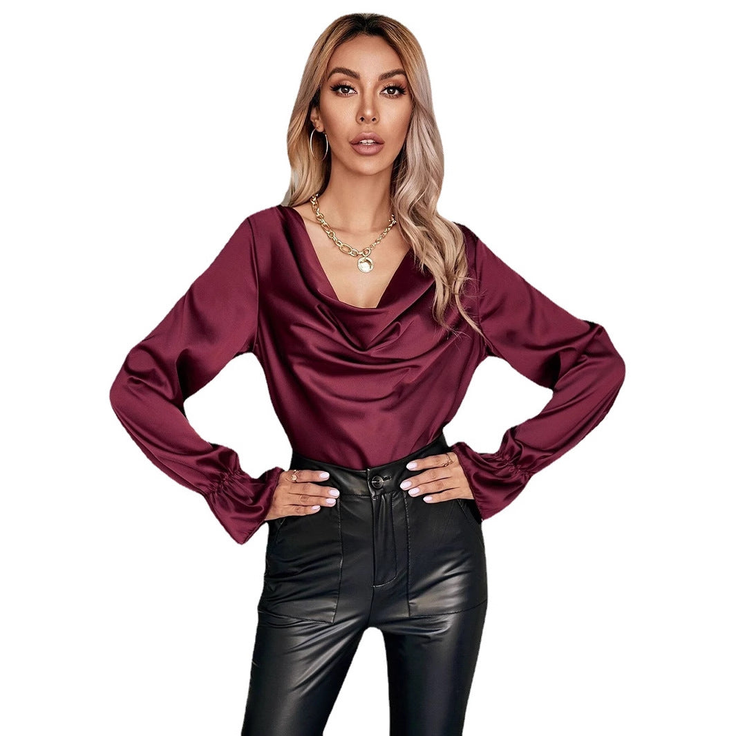 Damebluse med elegant drapering og voluminøse ærmer Stilla