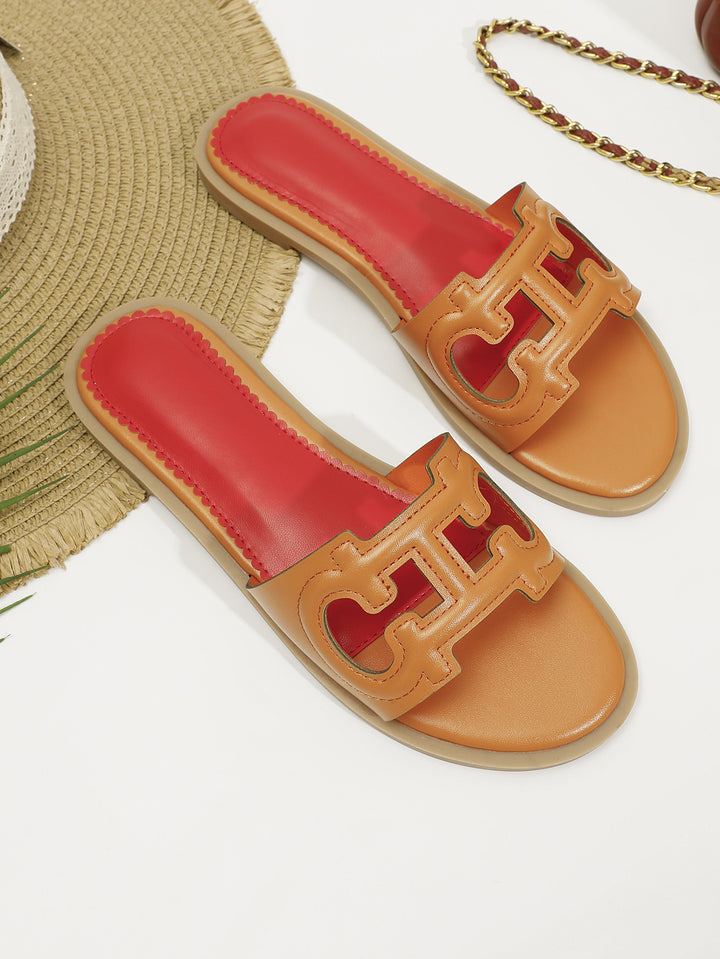 Dame mode slippers med iøjnefaldende logo Stilla