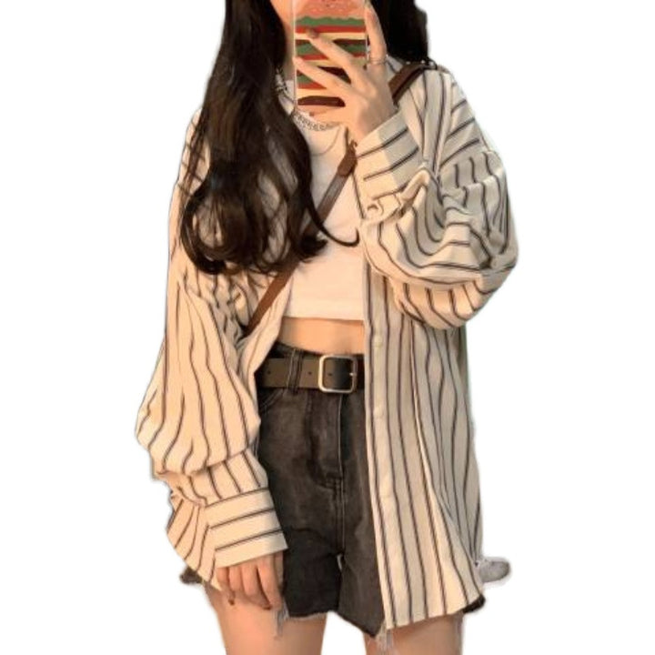 Kvinders stribede overshirt bluse i en afslappet pasform med oversized ærmer