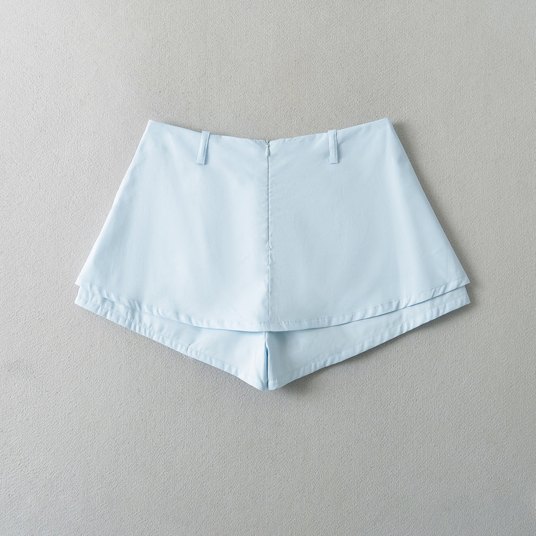 Dame modet High-Waist shorts med elegant snit og praktiske knapdetaljer Stilla