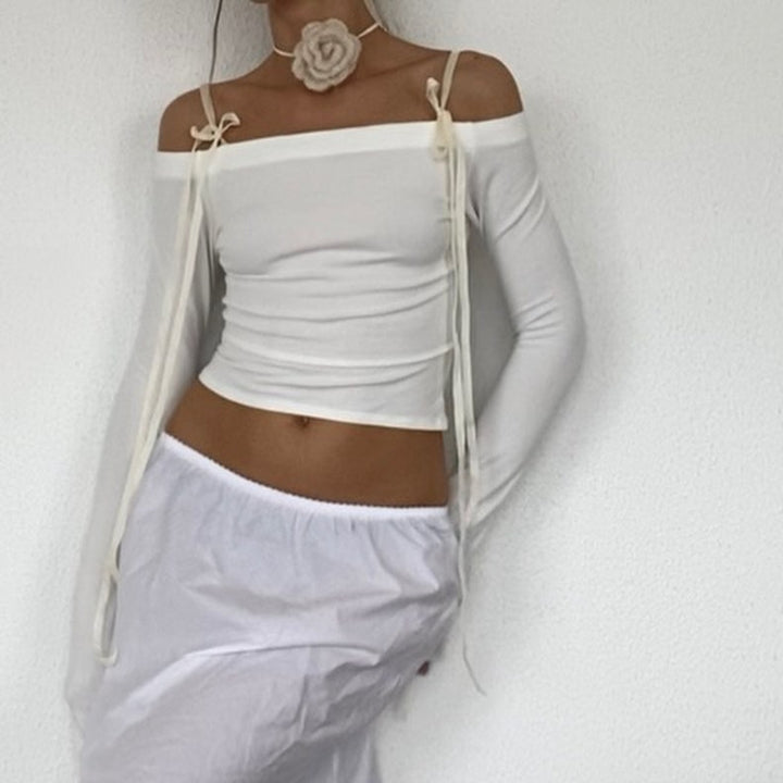 Dame overdel med off-shoulder-design og fine flæser Stilla