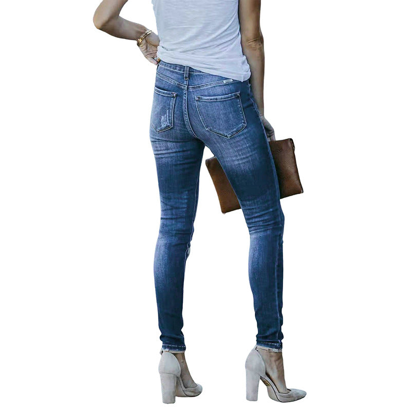 Dame High-Waist Jeans med knaplukning og elegant silhuet Stilla