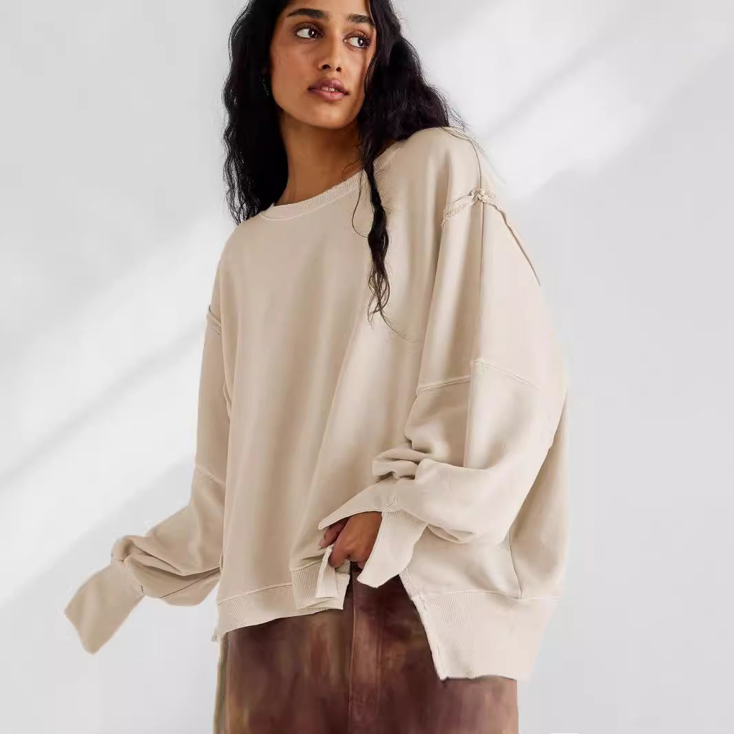 Dame afslappet oversized pullover med innovativt snit og fast stof Stilla