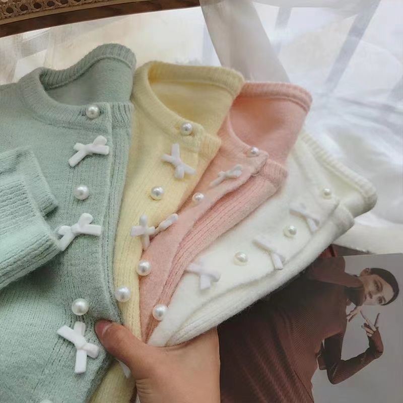 Kvinders hyggelige cardigan med perleknapper og delikat design Stilla