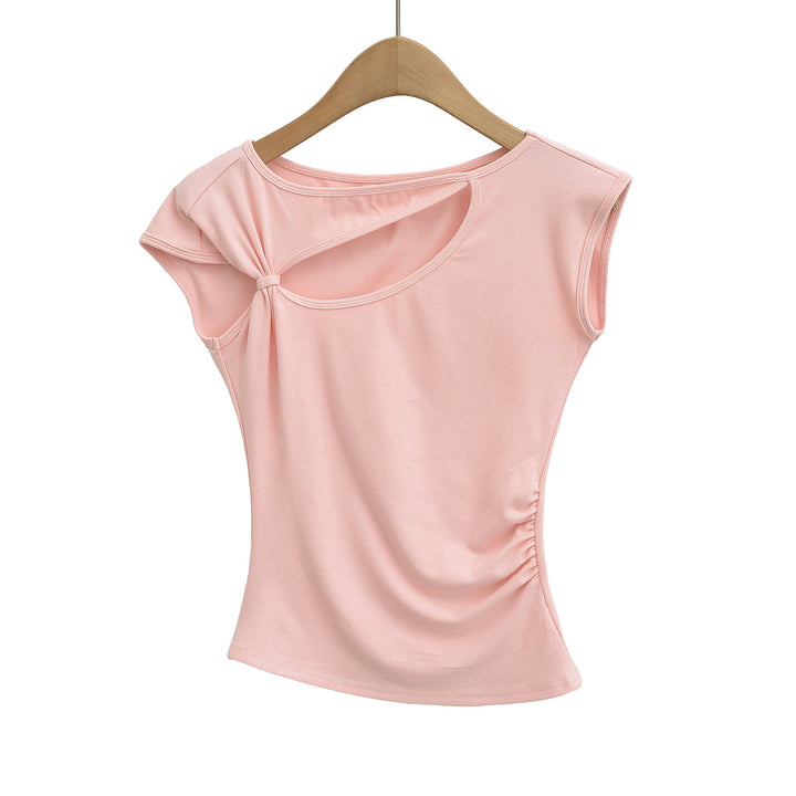 Dame sportslig top med asymmetrisk snit og modige cut-out-detaljer Stilla