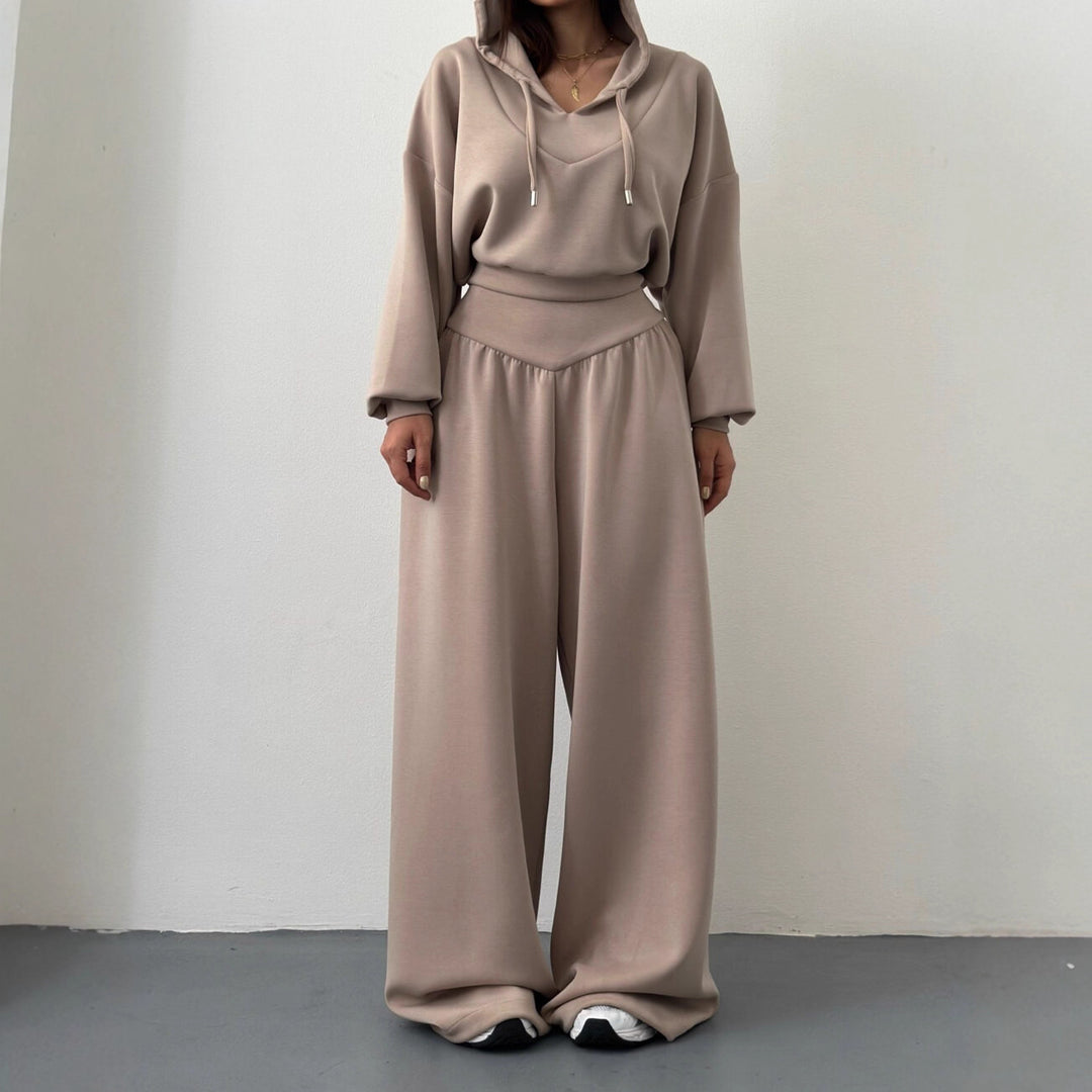 Kvindernes cropped hoodie og løse afslappede bukser kombination med fashionabelt snit