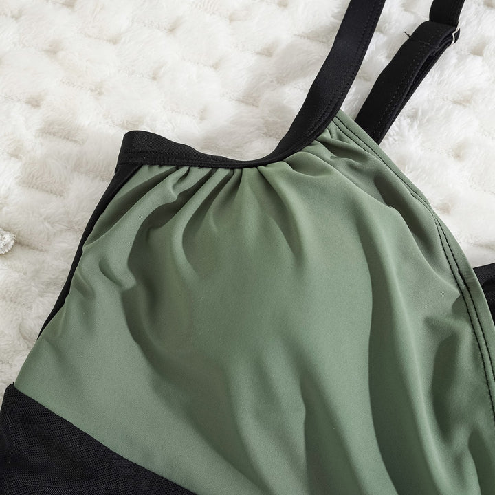 Dame enhed badedragt med stilfuld asymmetrisk design og justerbare stropper Stilla