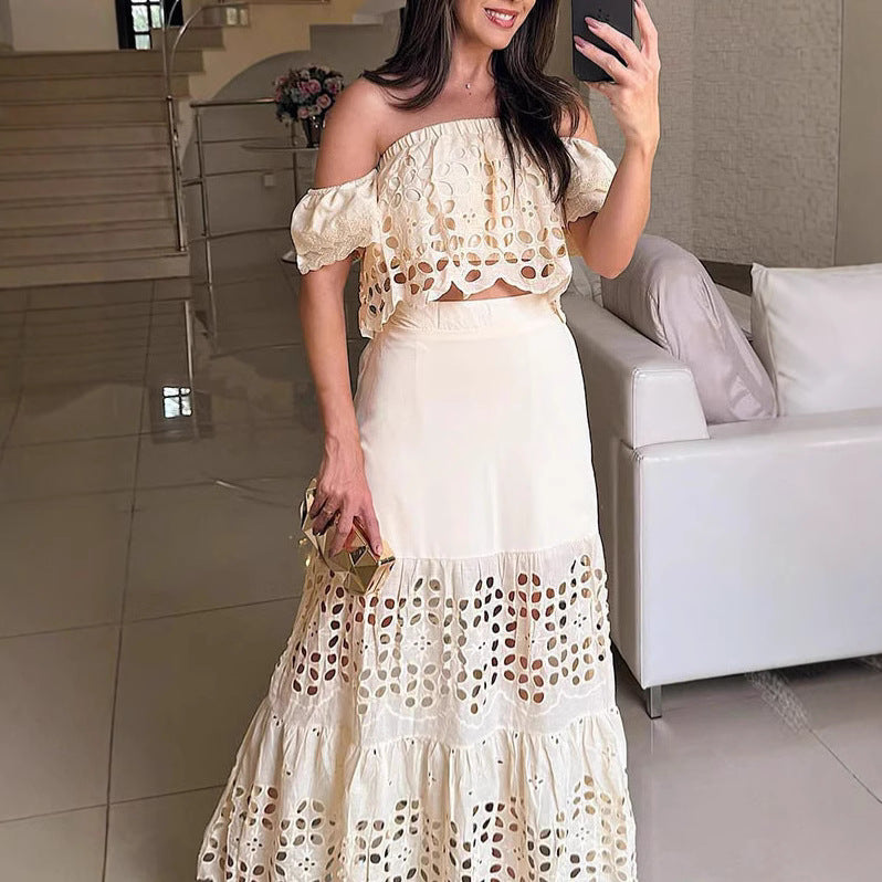 Dame Maxi-nederdel med raffineret cut-out-design og voluminøs kant Stilla
