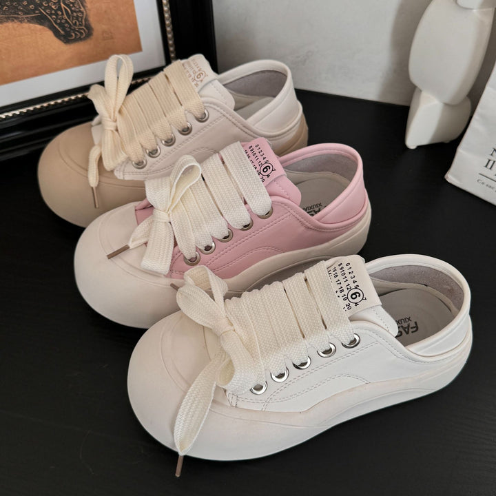Dame Sneakers i urban stil med komfortabel snøresystem og moderne kappe Stilla