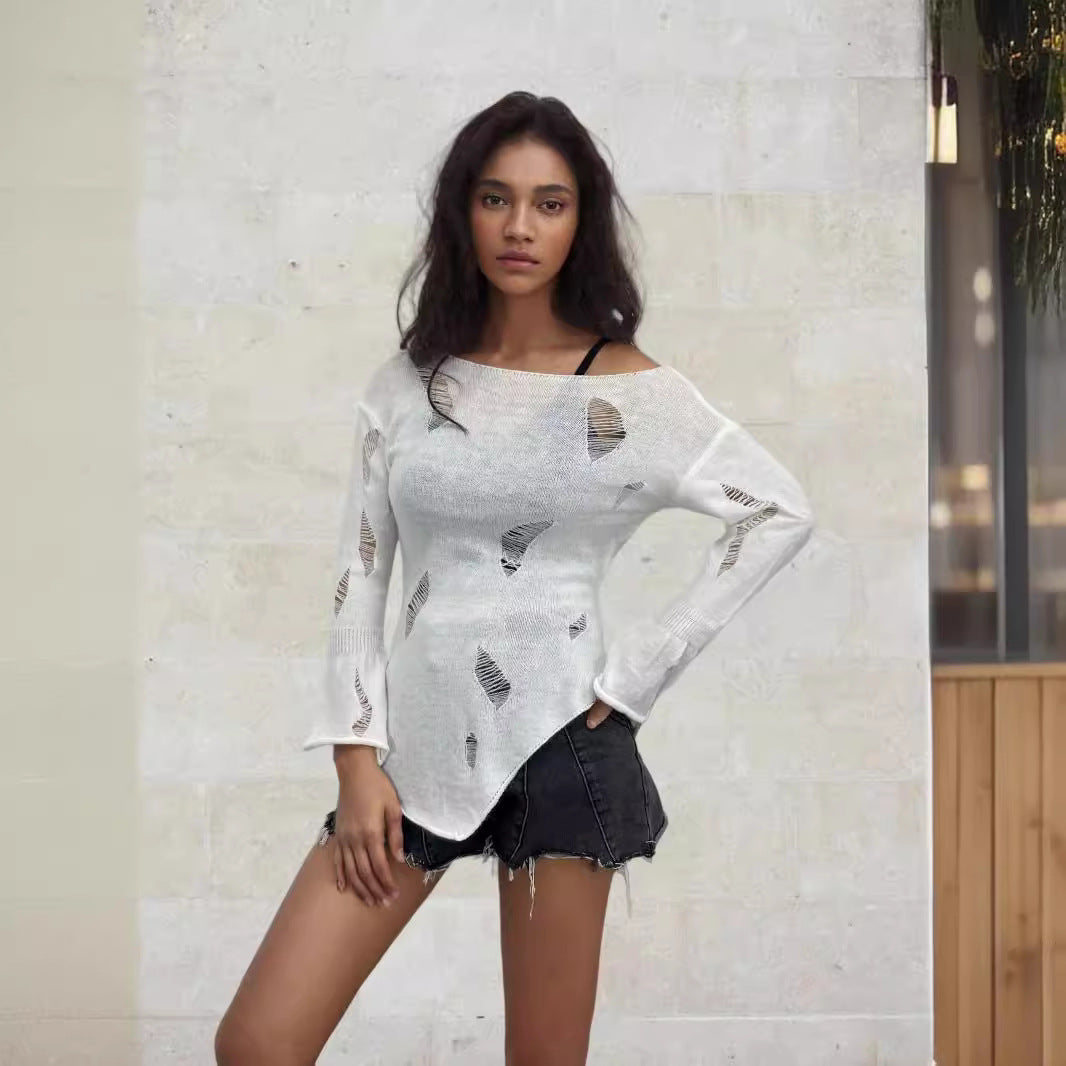 Kvinders urbane ribstrikkede sweater med slidte detaljer Stilla