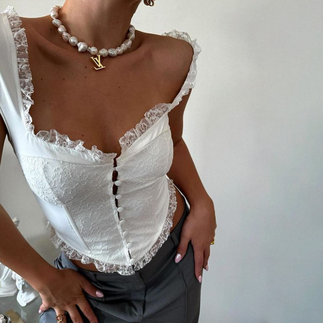 Damebluse i korsettstil med flæser Stilla