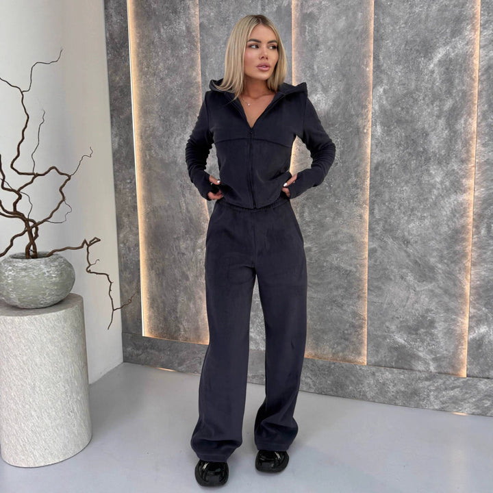 Kvinders fleece jumpsuit med høj krave og praktiske lommer