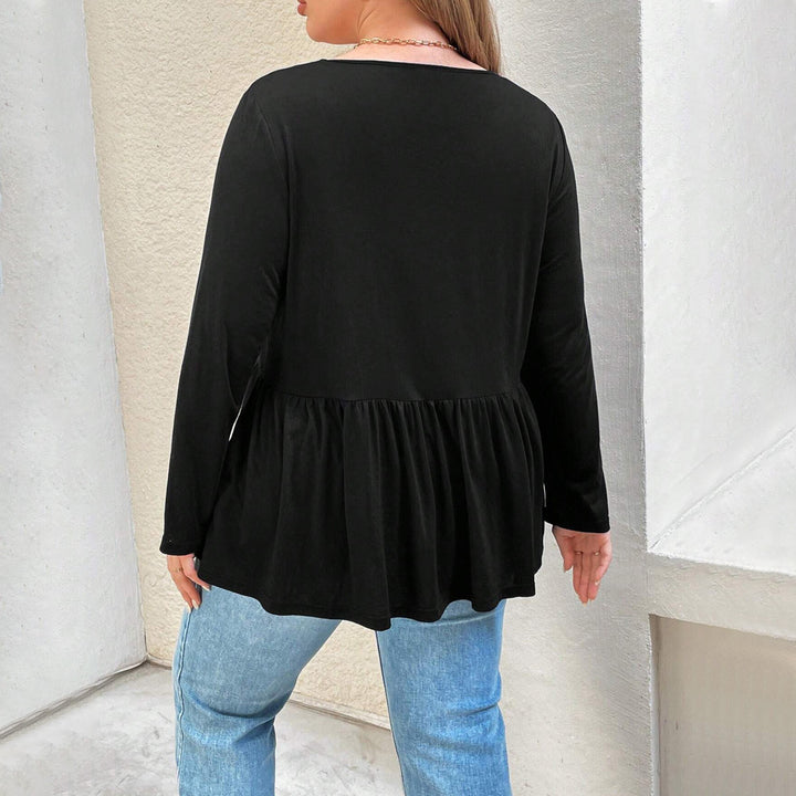 Dame Langærmet bluse med figursyet snit og elegant knaplukning Stilla