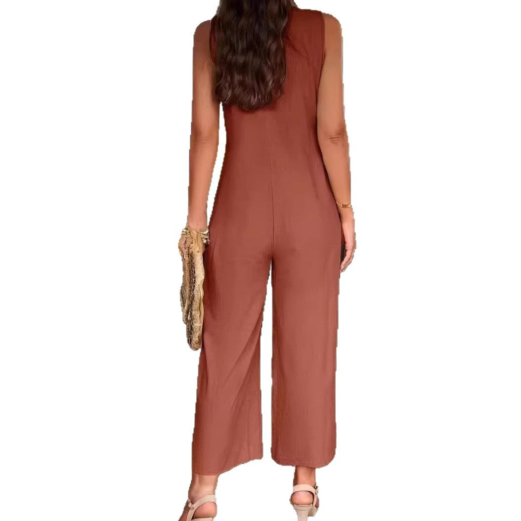 Damer Elegant Jumpsuit med knapdetaljer og praktiske lommer Skovae